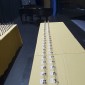 Two long rows of cups waiting to be turned over for the final time